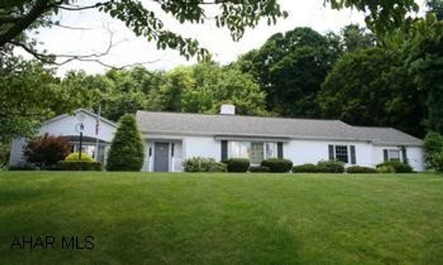 Prestigious Ranch Home located on 3.1 acres at top of Juliana Heights, overlooking the town of Bedford. Prestigious Ranch Home located on 3.1 acres at top of Juliana Heights, overlooking the town of Bedford. Private setting 4BR/3 full 2 half baths. Spacious family room has bay window, ceiling beams, fireplace and brick hearth. Galley kitchen, main level laundry room, formal dining room w/chandelier, formal living room w/fireplace and built-ins. Rec room in basement. Enclosed porch, patio. NEW CARPET, FRESH PAINT AND REFINISHED HARDWOOD FLOORS.