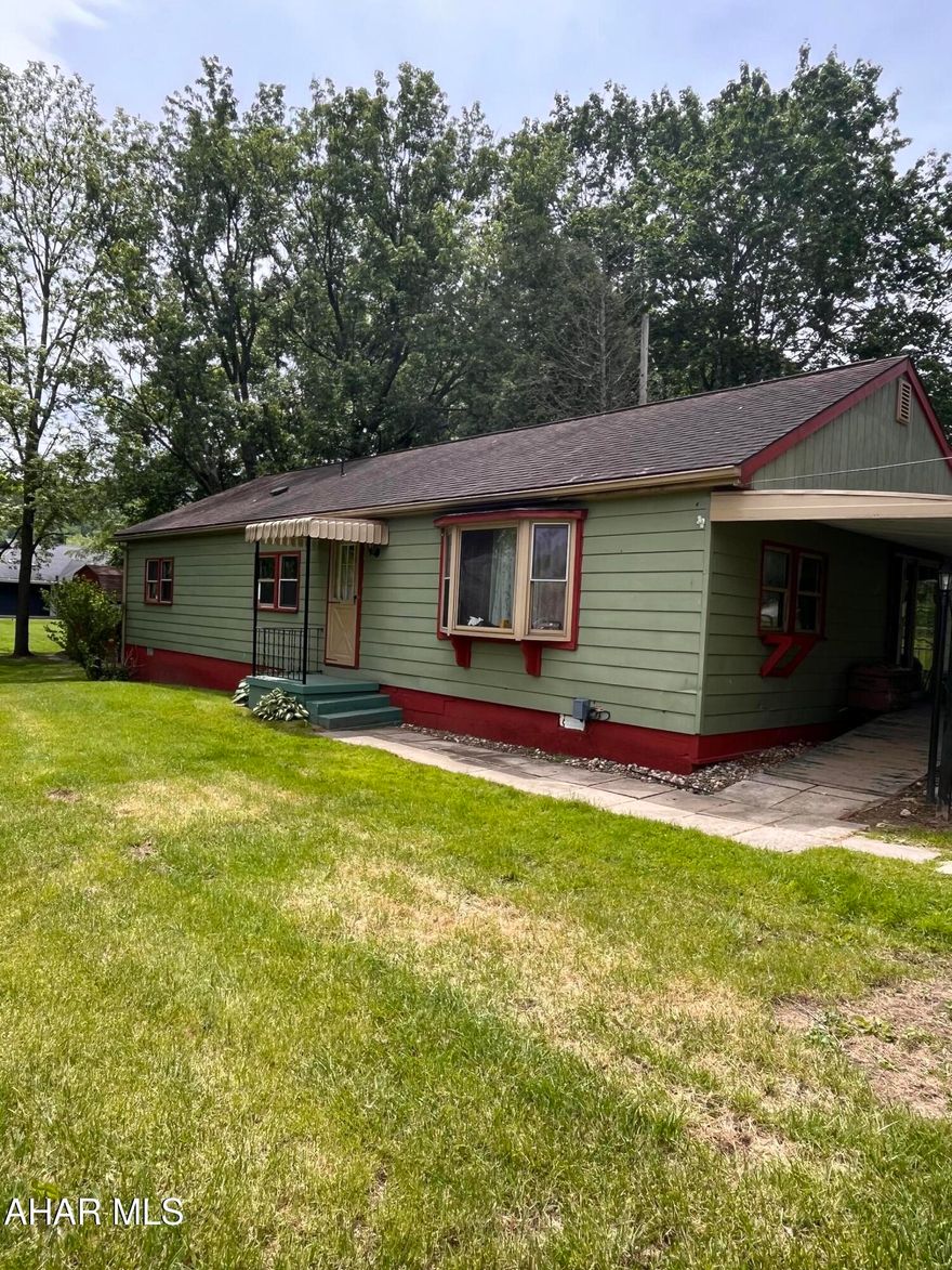 This home has many upgrades but is still in need of completion. Cash only - cannot be financed due to age. Large rooms, nice lot in a quiet spot. Large shed in back. Property still being cleaned out - interior photos will be added later.