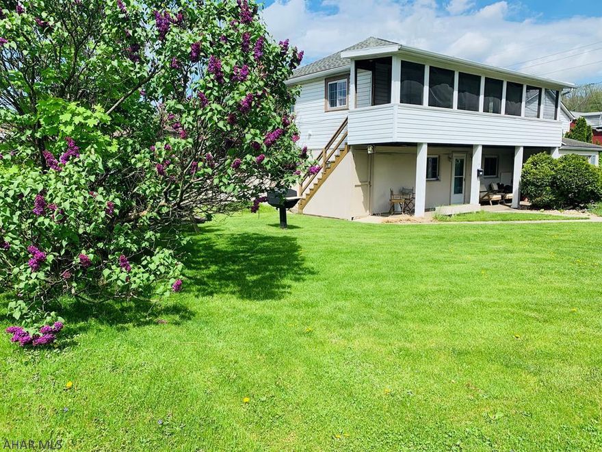 Move in and enjoy the convenience of a walkable location in historic Bedford.  This home lends itself to many possibiities.  Live for free in the lower level and convert the upper level to an income producing space for a nominal fee.  Relax on the lovely screened in porch or enjoy the covered porch on a quiet side street in Bedford.  Natural light is abundant as it floods the rooms with lots of light and upgrades make the home enjoyable and relaxing.  Natural gas is an added advantage.  Don't miss the opportunity to live in town for an amazing price.