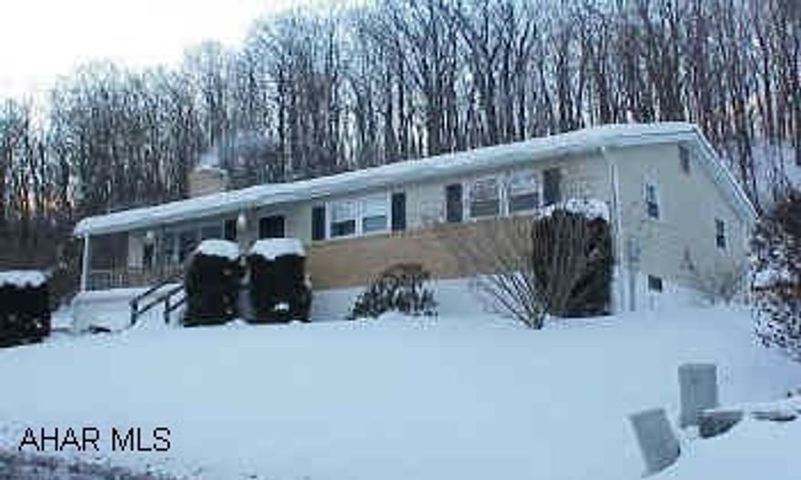 Wood stove in family room used as primary heat.  Nice size rooms.  Additional 4th bedroom in basement.