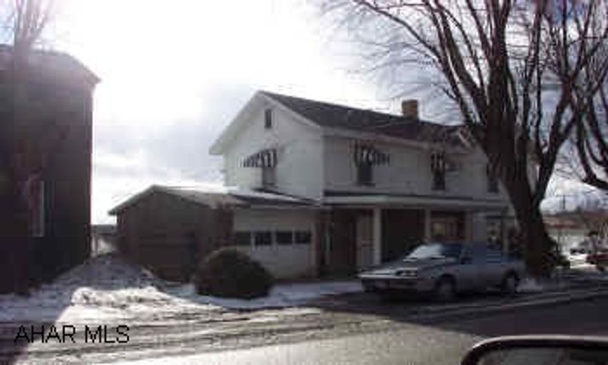 Partially remodeled 2 story with cherry kitchen.  The well is shared with the adjoining property-seller will remedy.  Call Jeff for appointment.