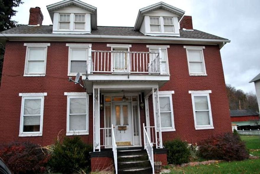 Beautiful two story home in Everett Borough. This home features a large living room and dining room, 3 large bedrooms, updated bathroom, nice carpets, some hardwood flooring, fireplace with wood insert, nice deck and a pavilion in the back of the house, as well as a fenced in yard. There is a 1 car garage plus a driveway and 2 additional parking spaces behind the house. Close to shopping and all amenities.