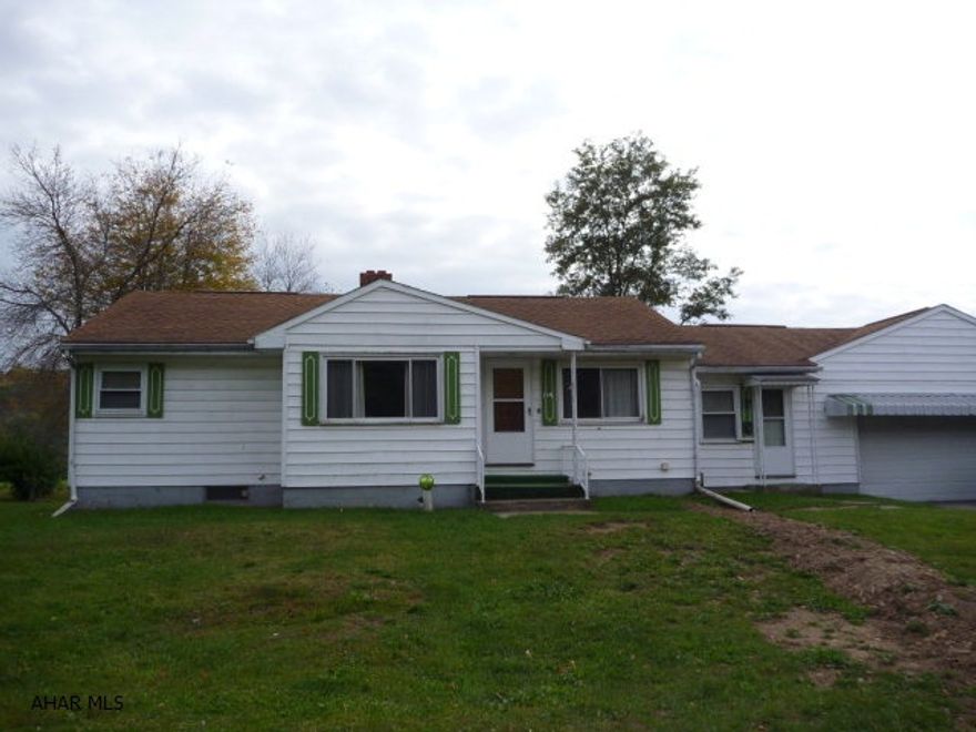 Super one owner 3BR/1BA Ranch in Bellwood-Antis School District. This home has so much potential. Fantastic location on a dead end street. Hardwood floors throughout home. Large back screened in porch off back of house. Over-sized one car garage. Two heat sources - Gas & Wood furnaces. Newer roof & windows (5yrs +/-). New water line to house.