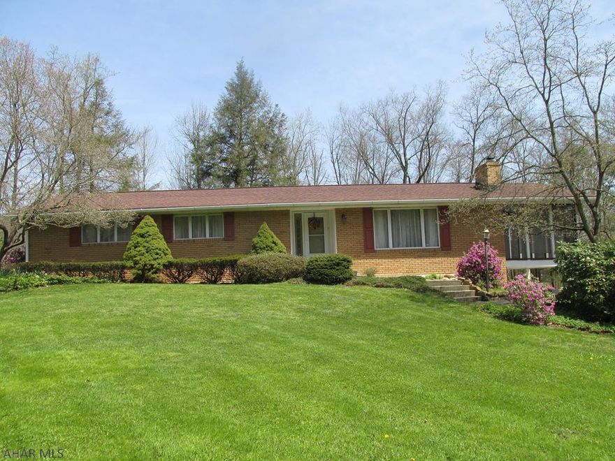 Private peaceful setting 3BR Brick Ranch on 2.58 AC - LR, Kitchen Dining Combo, Family Room, Master BR, Full BA, BR, BR, Screened porch, Integral garage and detached garage.  Solid Cherry Cabinetry, Wood burning fireplace (needs cap removed before using), Hardwood Floor in Family Room and Dining Area.  Anderson Thermopane windows, All Brick, new roof 25 yr shingles.  Central Air, All Electric home.  UV light on well, 100 Amp Breaker Panel and 200 Amp Breaker panel.  Septic is certified and updated.  Stream is from the Brush Mountain Reservoir and controlled, not a flood zone.  Agent is related to seller.