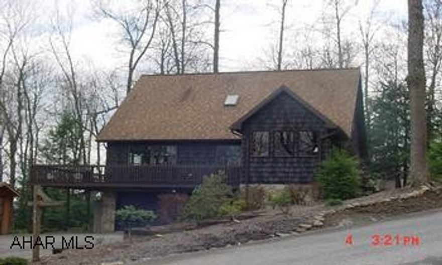 1.5 STORY, 3 BEDROOM, 2 FULL BATHS.   IMMACULATE!  BEAUTIFULLY DECORATED HOME, MASTER BEDROOM AND BATH ON THE FIRST FLOOR, THIS HOME FEATURES 2 SETS OF SLIDING GLASS DOORS THAT LEAD TO A WOODEN WRAP AROUND DECK .   MOVE RIGHT IN AND ENJOY THE VIEW.  ALL AMENITIES of GLENDALE YEAR ROUND, MINUTES FROM PRINCE GALLITZIN STATE PARK.   ENJOY THE ENERGY SAVING ELECTRIC STORAGE HEATING SYSTEM.