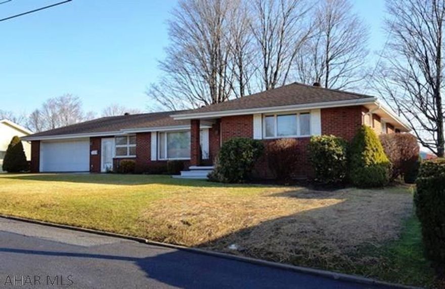 Well maintained, 3 BR, 2 bath brick ranch on a 100 x 100 lot in quiet residential neighborhood.  Warm, bright rooms with lots of natural sunlight, eat-in kitchen opens to dining room. laundry on main floor and in basement. Plastered walls, hardwood floors and gas hot water cast iron baseboard heat.  Spacious basement with ample room for storage or finish into additional living space. Oversized, heated 2-car garage with workbench. Move-in condition