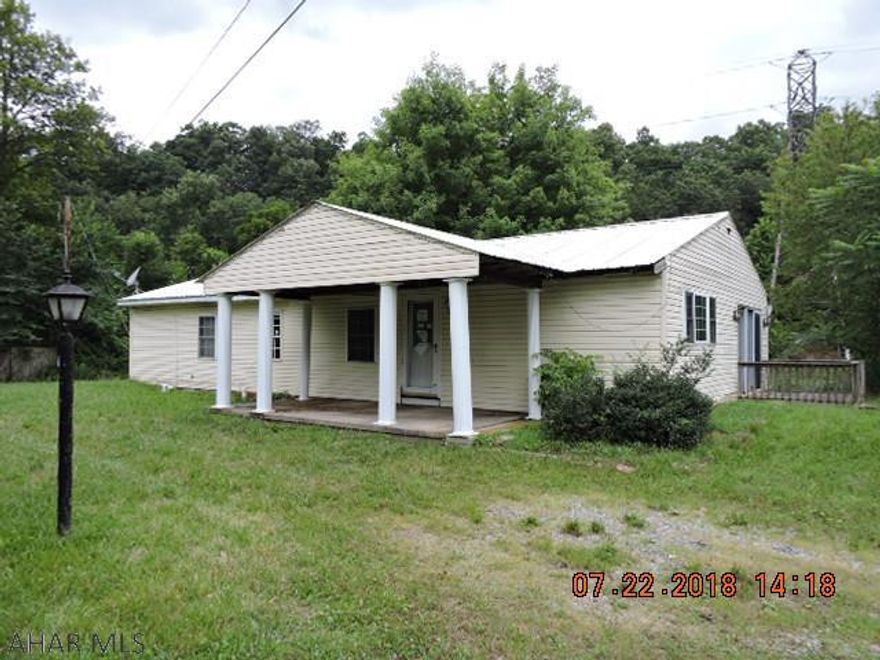 Nice oak kitchen with big dining area.  Addition has a big living room and master bedroom with walk-in closet.  Mudroom/laundry with door to covered deck.  Nice level lot offers privacy.  2 sheds for storage.  Minutes from Weaver Falls Boat Launch & State Game lands #67.  Per Courthouse records this is a 14x60 White and Blue Liberty mobile home with a 14x60 addition on piers.  There is no title information and no tags are visible.  Per Hopewell Township the sewer will be $47/mo starting Jan 2019