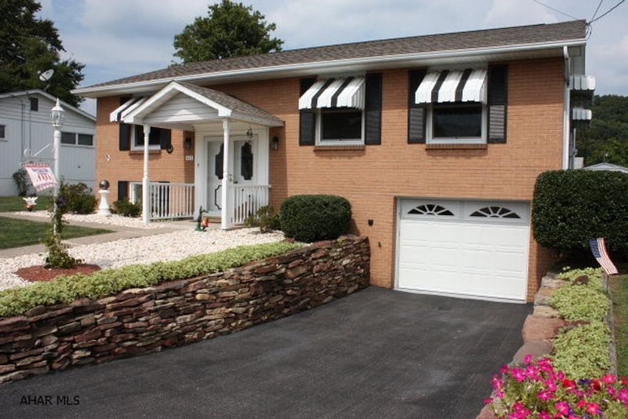 You won't want to miss this easy to maintain home it tip-top condition.  Exceptional maintenance and pride of ownership for the home includes new windows throughout, a large 20x20 addition with a gas fireplace/stove with a composite wood deck.  Oak kitchen with nearly new appliances.  Move in condition.  Large level lot in a cul de sac with 2 sheds for storage.  Family room on lower level with 1/2 bath could easily be a 4th bedroom.  Master bedroom also has a 1/2 bath.  New 3-dimensional shingle roof.