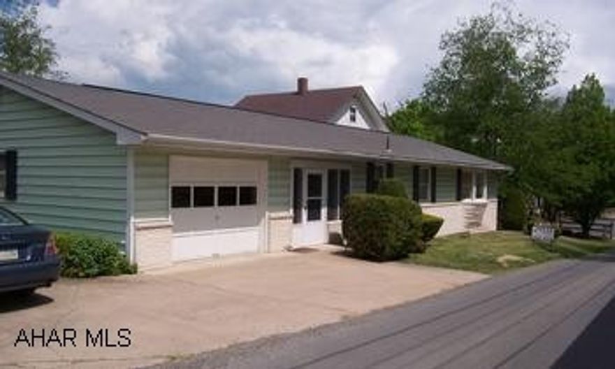 Immaculately kept ranch home in Williamsburg.  Features include an attached garage, breezeway, finished basement with woodburner.  Must see! Call Kara 312-5160.