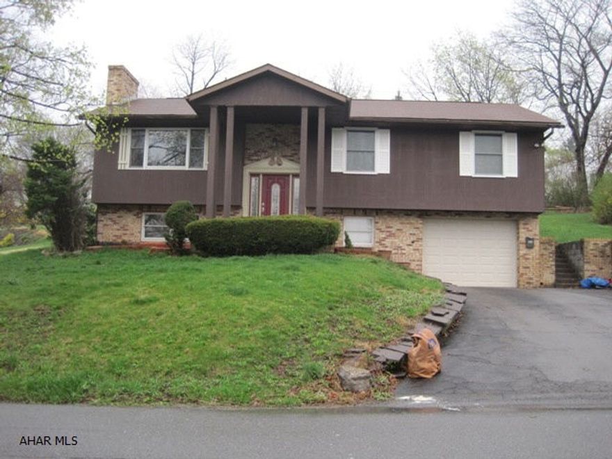 Totally updated three bedroom with two full baths. Beautiful kitchen with tile floors, new maple cabinets, solid surface counters and all new stainless steel appliances.  Large living room with brick fireplace and hardwood floors.  Master bedroom flows into all new full bath.  All interior doors are solid six panel.  Lower level features family room with another fireplace/woodstove and full bath.  Extra special with this sale all furniture is included except master bedroom suit.