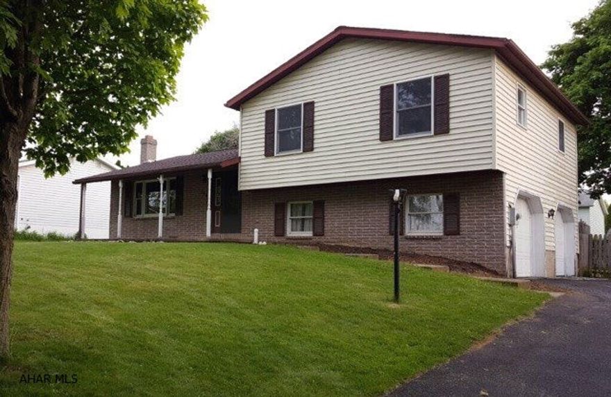 Don't miss this spectacular Multi-Level home as it is waiting for you to move right in! This 3/4BR & 2BA home has had many updates. All new laminate flooring and freshly painted throughout. Offering large living room, formal dining room with chair rail and glass slider out to the large fenced in back yard, spacious kitchen with loads of counter space and cabinets. Master Bedroom has it's own full bath with new vanity and toilet. Basement was recently finished to accommodate a family room and a bonus room, that has been used as a bedroom, with a walk-in closet. Not to mention the over size 2-car garage with room to have a workshop.