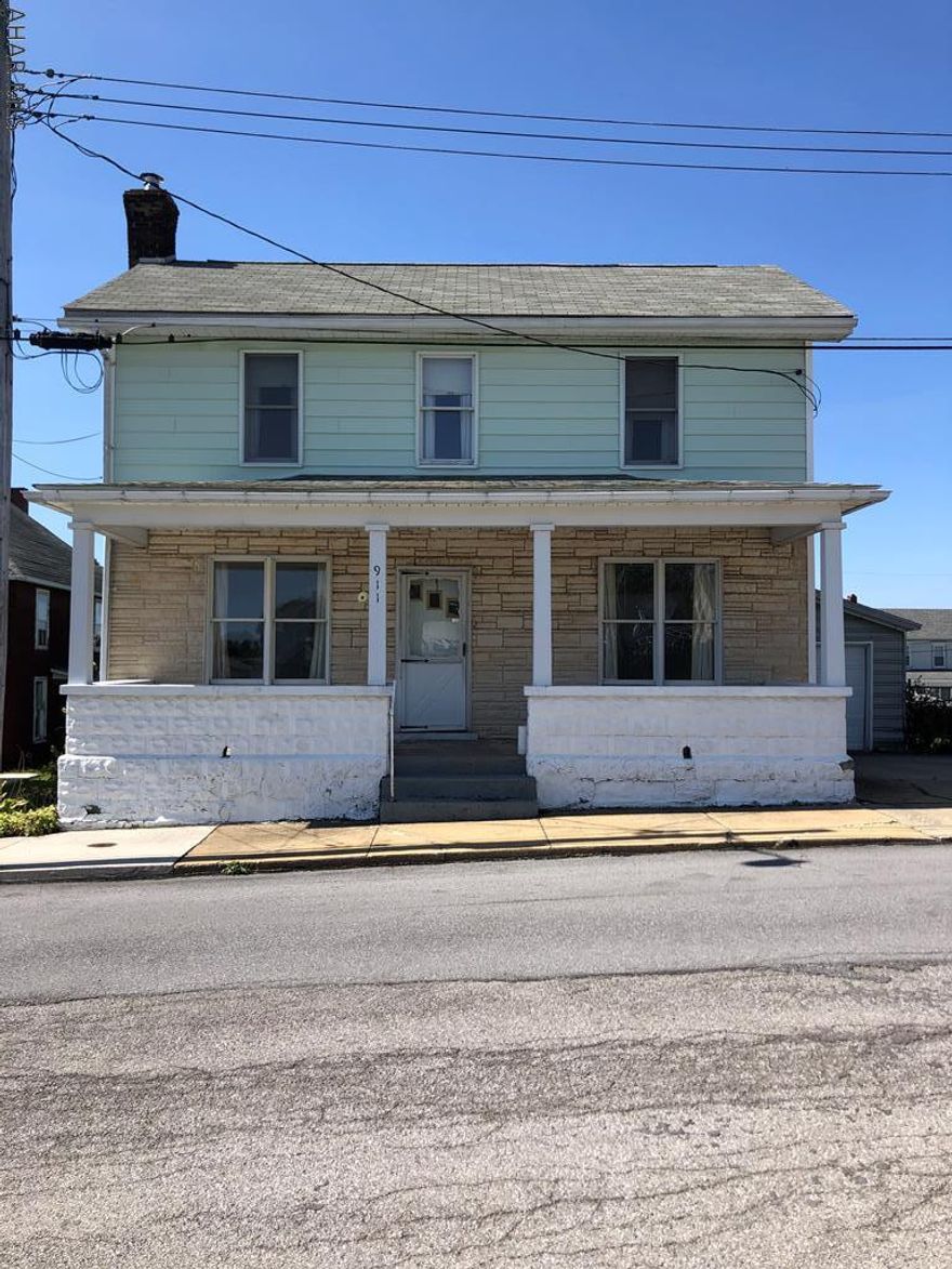 This would make a great starter home.  Kitchen includes all appliances, off the kitchen is a large laundry/pantry room and also a heated sun porch.  Hard wood floors are featured in the family room, living room is large and bright.  4 bedrooms and a full bathroom complete second floor.  Bathroom has new vanity and toilet.  Roof was replaced in 2005.  Newer furnace and new hot water heater.  Motivated seller.  Call today to see this property.