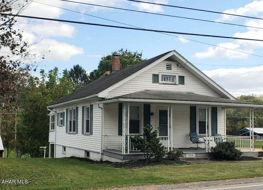 Great 1-story living with 2 bedrooms, 1+3/4 bath, spacious living room/dining area, vinyl sided + vinyl windows, nice front porch + detached garage. J-637