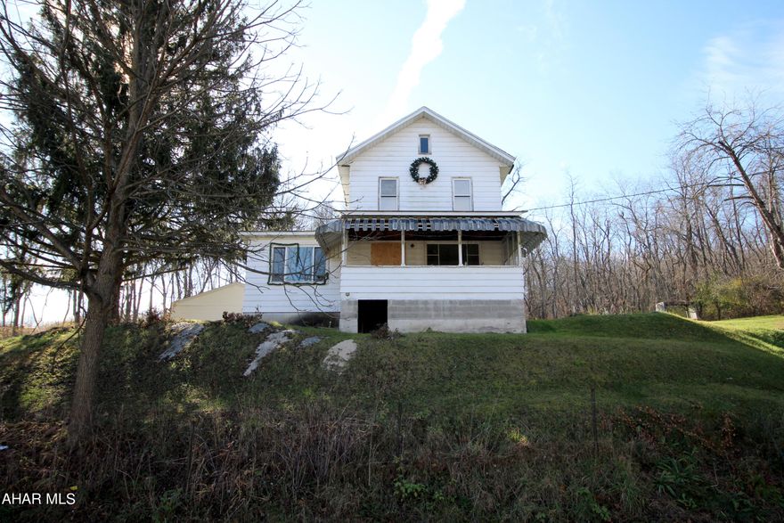 Situated on .64 acres, this 3 bedroom home is in search of a new owner to bring it back to it's glory. 2 stall detached garage. View in person to appreciate the full potential and see how you could make this home your own. Easy access to I-99. Close to many major amenities.