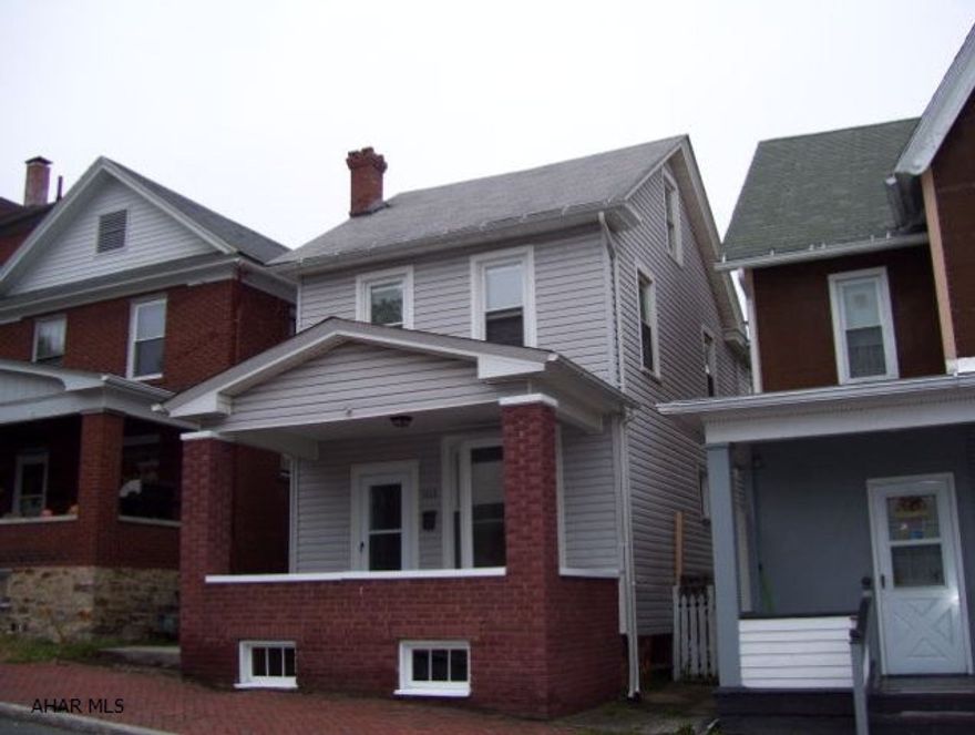 Beautifully updated home is the highlight of the neighborhood! Home has hardwood and ceramic tile floors.  All new stainless steel appliances included.  Fantastic remodeled kitchen.  Nice fenced-in yard with off-street parking. Finished Attic could be a 4th bedroom. There has been a new water line installed.