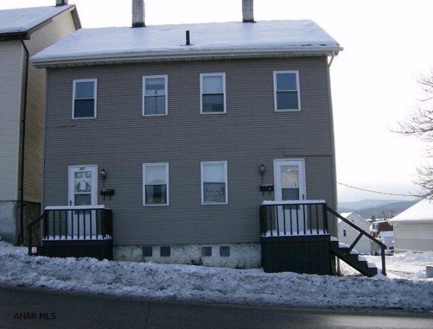 2 Unit Apt building- 2 BR each, vinyl sided. Was Sect 8 -All separate utilities. Must be sold with 407-409 17th St & 1704-05 4th Ave. W/ all land behind