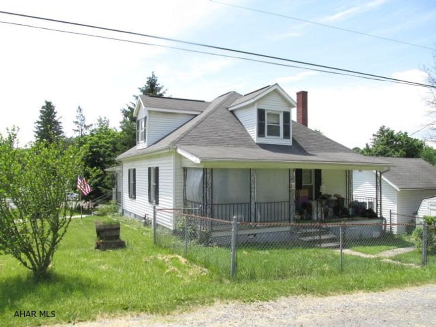 Nice large corner lot - lots of potential. Vinyl sided, convenient location, set-up as apartment with separate entrance driveway. Living Room, dining room, 2 bedrooms, full bathroom on main level. Lower level 1 bedroom apartment with kitchen, laundry, bath.