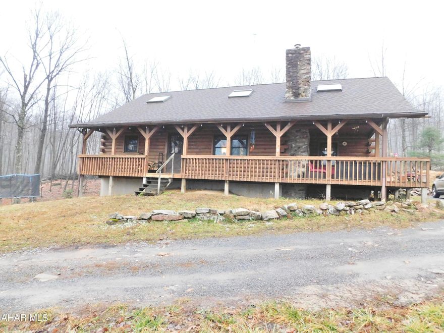 Time to enjoy the wildlife and serenity of this 16-acre log home in Logan Township!  Walk through the doors and you will be welcomed by the Great room with stunning exposed log beams and a beautiful stone fireplace.  The first floor flows openly through the dining room and spacious kitchen.  Step beyond the dining room into the three-season room which can double as an office and even perfect mudroom for all of your winter wear.
The first floor also features two sizeable bedrooms and a full bathroom.
As you venture up the staircase, you will be in awe of the design and framework of the home.  At the top, you are welcomed by the open loft area perfect for reading or relaxing.  This second floor also features two additional bedrooms with plenty of storage space as well as a full bathroom.
The basement is the final piece of this puzzle.  Here you have the beginnings of the perfect game room, home office, or family room.  With brand new flooring and drywall, all it needs are your final touches.  With the 3rd bathroom and all of the potential this space offers the sky is the limit with what this space can become.
As we head to the two story, two car garage we travel upstairs.  Here we find a smaller work space as well as a small restroom.  We then enter the doors into a magnificent game room, sports cave, or even a guest house. 
Homes like this are rare and do not come around often.  Schedule your private tour today!