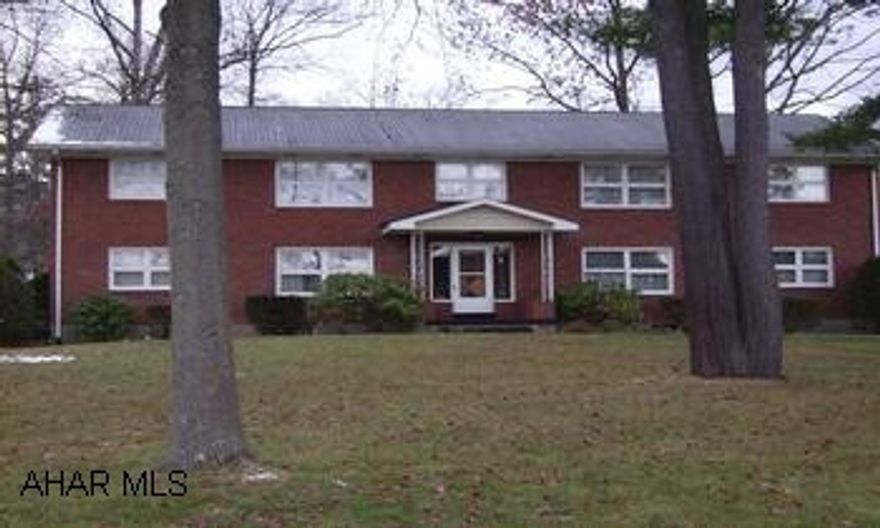 Large Brick 4 Unit with full basement. Individual laundry hook ups for Tenant owned washers and dryers. Roof 1996...30 yr shingles. Garage roof 2006. Owner pays heat, common area electric and sewer. Tenants pay trash and electric. Water softner owned. Well cared for property. Good Tenants.