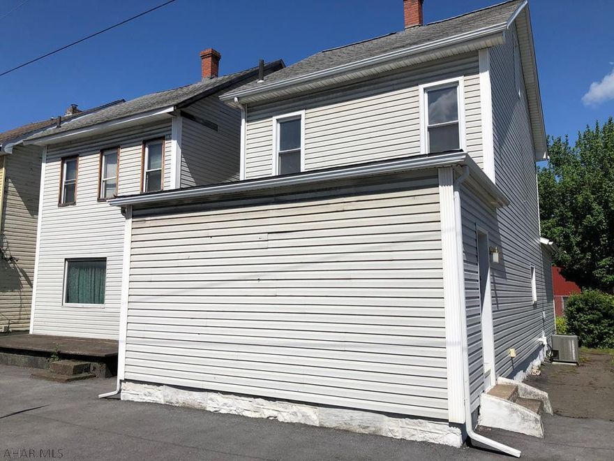 Stylists, barbers, investors! Here is your chance to purchase your very own salon with the potential to expand or renovate the unfinished side for you own home or rental income. All remaining items will stay with the property. Off street parking in the rear. Vinyl exterior makes for low maintenance. This is 2 buildings connected by a walk-through area that currently has a jet tub. Tons of potential at this property.