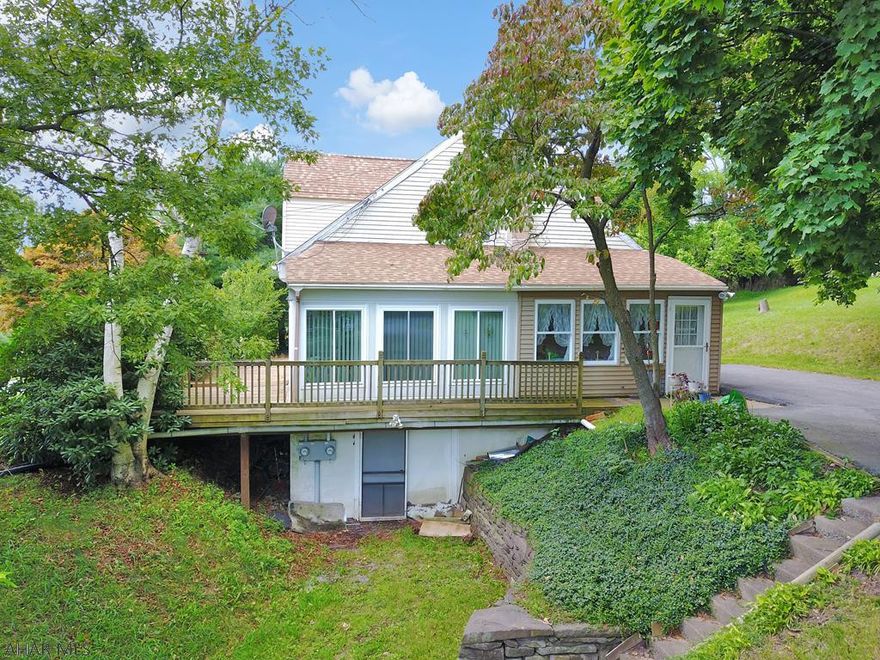 Nestled on the mountain between Pleasant Gap and Centre Hall is this prime 6.17 acre property. Build your new home on the 1.83 acres of wooded area where the view is incredible, and rent the current home or use it for friends and family for Penn State game weekends. The 1-1/2 story home features 5 bedrooms, 2 full baths, 2 kitchens, new roof, and a heated 4-season room. The home was previously a duplex and has separate electric, 2 furnaces, 2 water heaters and separate entrance. The property also features a metal barn with 2 horse stalls and separate electric, with 4 of the acres previously a pasture. There are so many possibilities for this special property so don't wait! Fantastic location within 12 miles to PSU and Beaver Stadium.