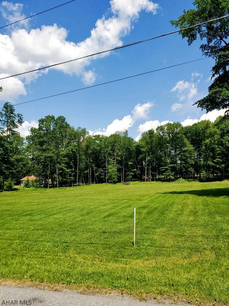 Level lot 2.07 acre; cleared and ready for building. Public water and sewer available. Near recreational area. Jackson Twp; Central Cambria School District.