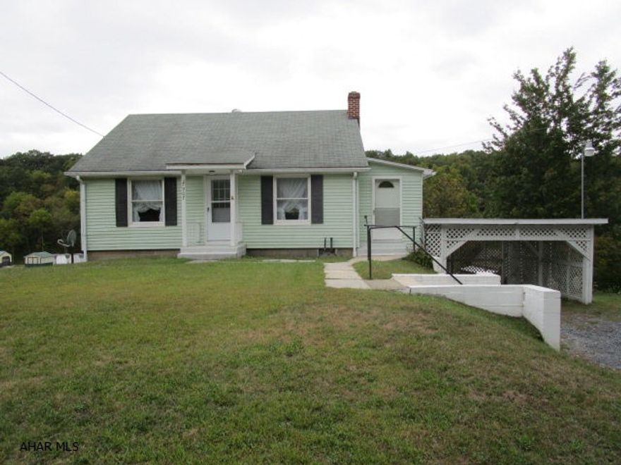 Cozy cape cod home offering a living room, kitchen, dining room, 3-beds and 1 bath.  Full unfinished basement, oil hot water heat and 100-amp electric.  Enclosed porch and two-car carport.  Very economical property with low taxes.  Vinyl siding, replacement windows and a shingle roof.  Public water and private septic system.