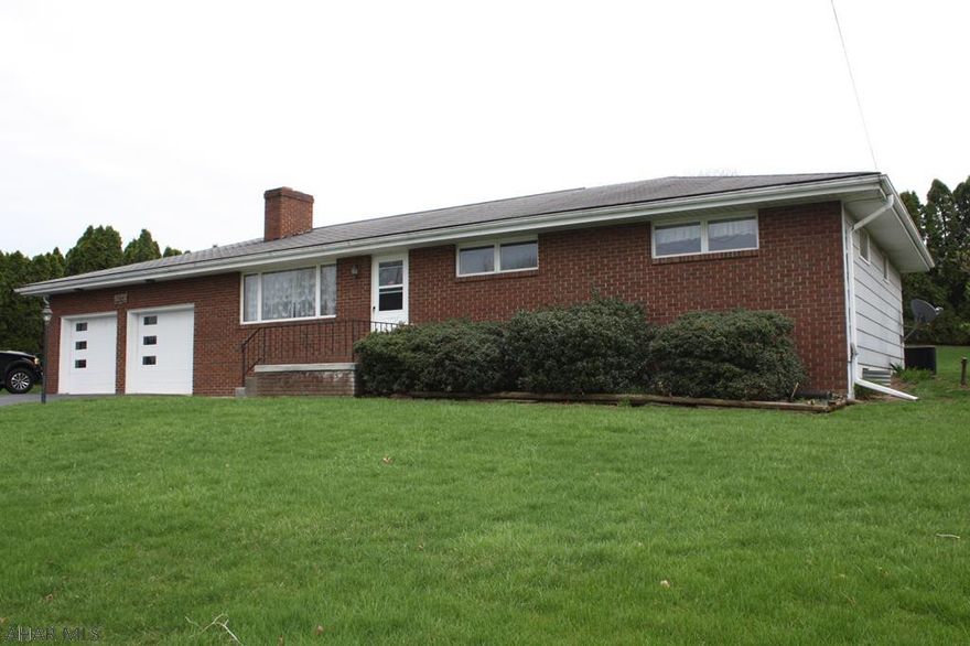 Property is surrounded with large arborvitaes for privacy.  Large yard and deck on the back for outside enjoyment.