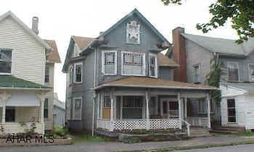 Rehab investment opportunity.  Some freeze damage.  Nice size rooms, beautirul wood staircase, & stained glass windows.