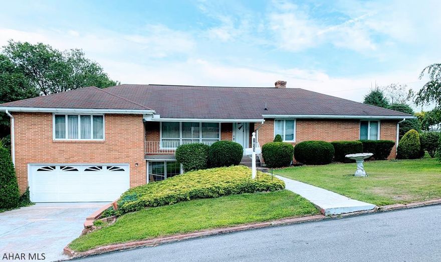 This large one of a kind one story brick home offers so much potential. Main floor offers an open concept with large kitchen with island and built in appliances w/ double oven, 3 bedrooms,1 full bath with double sinks, sunroom, hardwood floors under carpet, and additional space that could be a mother in law suite or an apartment with one bedroom, full kitchen and bath. Large basement  features an open kitchen, family room, bar, large room that could be a large 5th bedroom or recreation room. All this sits on a beautifully manicured large .31acre corner lot with a large pavilion that is great for entertaining. 1 car integral garage with bonus room or storage, shed, C/A. Keep this beauty as your personal single family home or live in one space and rent the other 2 spaces.