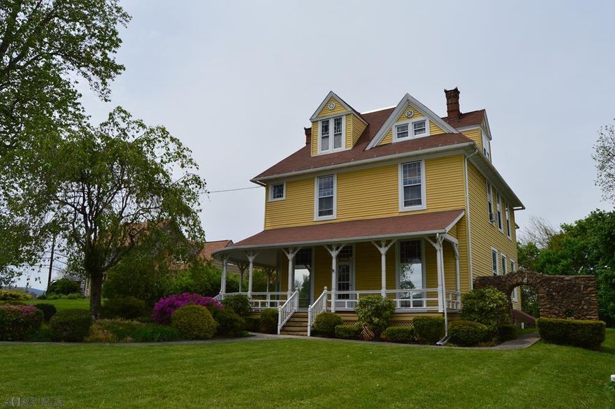 Beauty and character inside, this home is full of lots of opportunities.5 bedroom, 2 full bath. Unique stone entrance wall, gorgeous fireplaces throughoutthe home, and a wrap-around porch overlooking a beautifullylandscaped yard.Perfect location in the heart of Hollidaysburg.