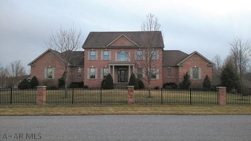 Spectacular home in Emerald Estates.  Features include:  Inground 20'x46' heated pool, brick pool house, outdoor brick fireplace, Trex decking, covered balcony, covered porch, fenced yard, 1.2 acres, open floor plan, 9' ceilings on 1st floor, 18' ceiling in the family room, 2 gas fireplaces, 7 zone gas hot-water heat, maple cabinets, granite counter tops, kitchen island, 50-year architectural shingles, 400 amp electric, hardwood and porcelain-tiled floors, warm colors, custom window treatments, and a 4-car garage. This property recently appraised for $650,000. Please take a look at the two videos. One shows an aerial view of the property.