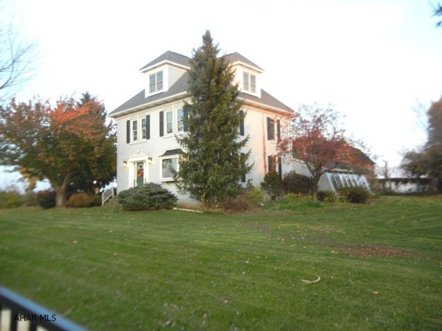 Refurbished farm house offers plenty of space for the large family. Family room has brick wall with woodburner and built-in bookcases. Sunroom with brick floor and shatter resistant glass, first floor laundry with half bath, oak kitchen with pull out pantry, built-in desk, reverse osmosis at sink. Third floor bedroom with full bath and walk in closet.  Master bedroom with bath and walk in closet. Tile entranceway with leaded glass door. Replacement windows and geo thermal heating/cooling. Includes 2 story barn with 3 bays, loading bay, corn crib, tractor and hay storage. Silo, stable with 6 stalls and office, shed w/elec, goat house with fenced pasture, chicken house, electric fenced pasture,  inground pool (not used), fruit trees, grape arbor, garden area. New water line. Two wells. More!