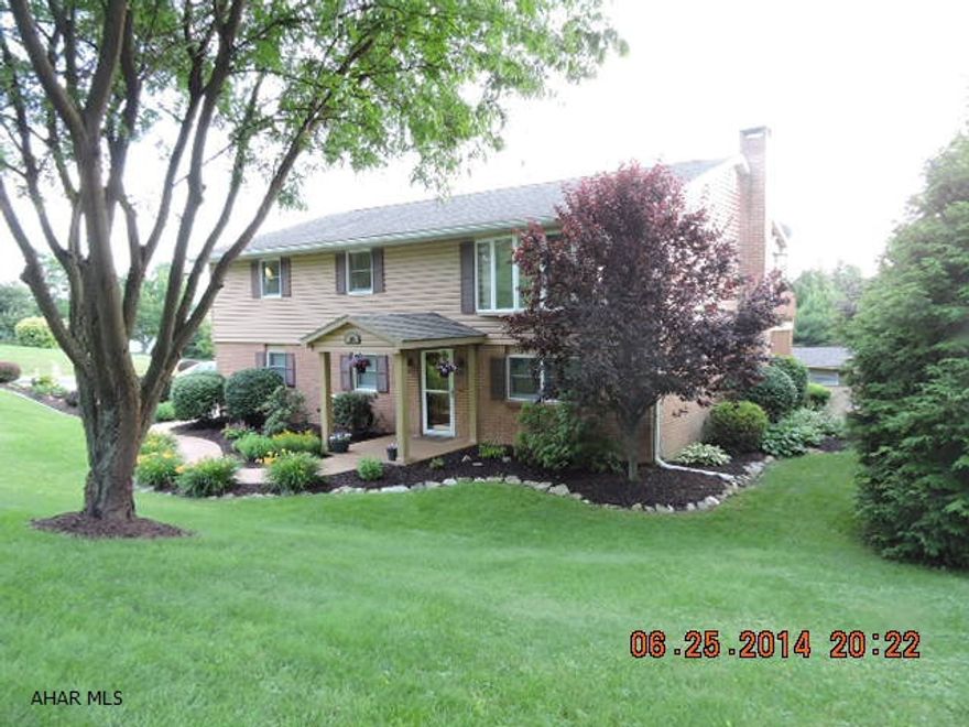 Super raised ranch w/lovely views of mountains & Hollidaysburg. Immaculate - just move in.  New vinyl siding 2007. Large 2 car integral garage.  Big shed with workshop.  Shed overhead door has electric opener.  Well landscaped including raised garden bed full of tomatoes, peppers, & basil.