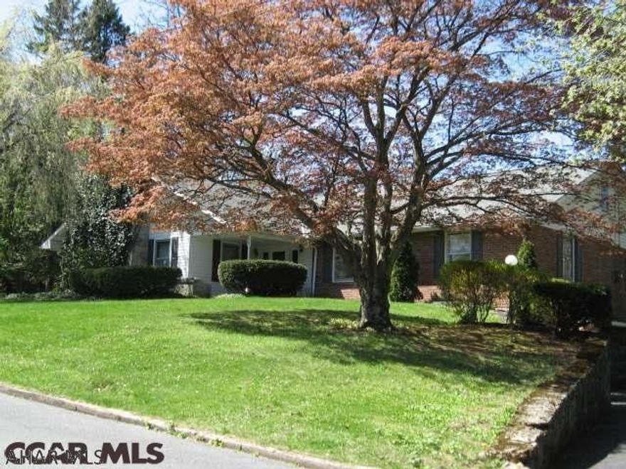 Don't miss out on this rare find in State College.  A lovely mid-century modern home situated on a large partially wooded 1.40 ACRES.  Containing over 3000 sq. ft. of living space. This home has lots of storage, 22 new energy efficient windows, hardwood floors, newer furnace, Central AC, 3 porches, 2 fireplaces, and located minutes from Beaver Stadium. IT IS NOW PRICED SUBSTANTIALLY BELOW APPRAISAL DONE IN APRIL 2017!!!