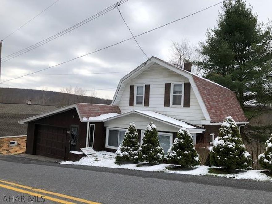 Lovely 2 bedroom starter. Home with enclosed porch and deck. Move in ready . Priced to sell.