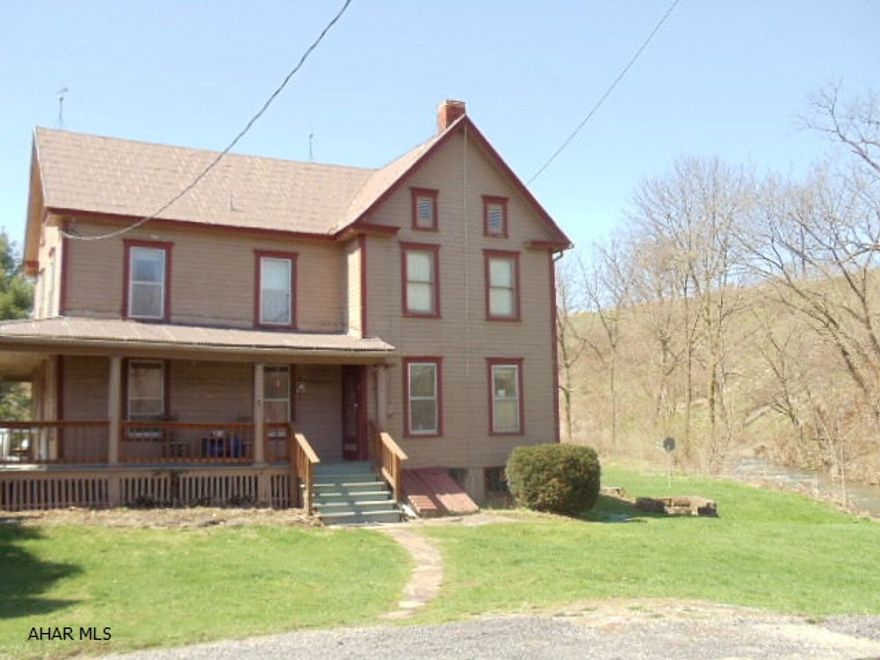 Stocked Trout Stream Beaver Creek borders property.  State Game Lands for Hunting approx 1 mile.  Nice 2-story home with wraparound porch, hardwood Floors, 1st-Floor Laundry, New Wood/Coal Furnace + 4 propane wall heaters & wood stove in dining room.  #J-064