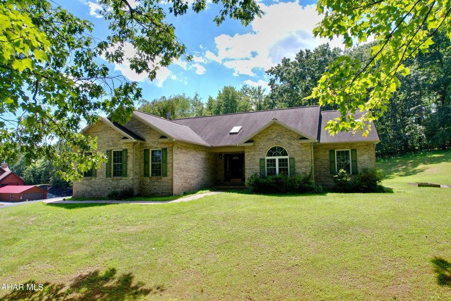 Beautiful mountain views from this ranch home situated on 2.19 acres.   The home welcomes visitors with its charming open floor plan, gas fireplace, and designer dining room.  3 Bedrooms on the main floor with 2 additional bedrooms in the finished lower level.  Come and sit in the great room and enjoy the inviting lower level space offering 2 additional bonus rooms.  The bonus rooms can be office, exercise room,  gaming room, hobby room, bedrooms, and more.  The large private, flat back yard is canvas of potential for entertaining, possibility for a pool, additional outdoor living space, etc.  3 sides of the property offer a private tree line securing privacy.  And this property includes an under ground dog fence for the 4 legged friends.  Minutes from the schools, close proximity to I99, Rt 56, Pa Turnpike, Shawnee state park, blue knob state park and more.