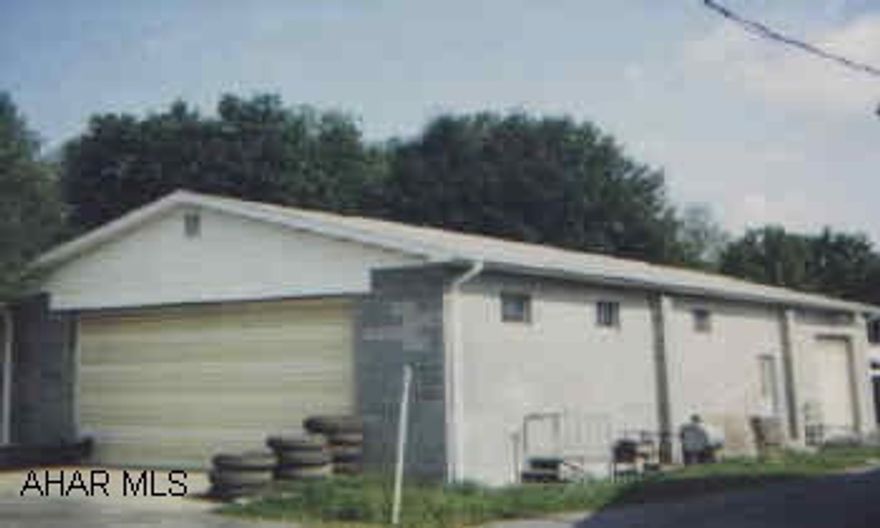 PRESENTLY USED AS MOBILE HOME SALES WITH SOME RENTAL UNITS.  220 V.ADD'L BUILDINGS, CONCRETE FLOOR. 4 PRIME ACRES W/400 FEET FRONTAGE ON BUSINESS ROUTE 220