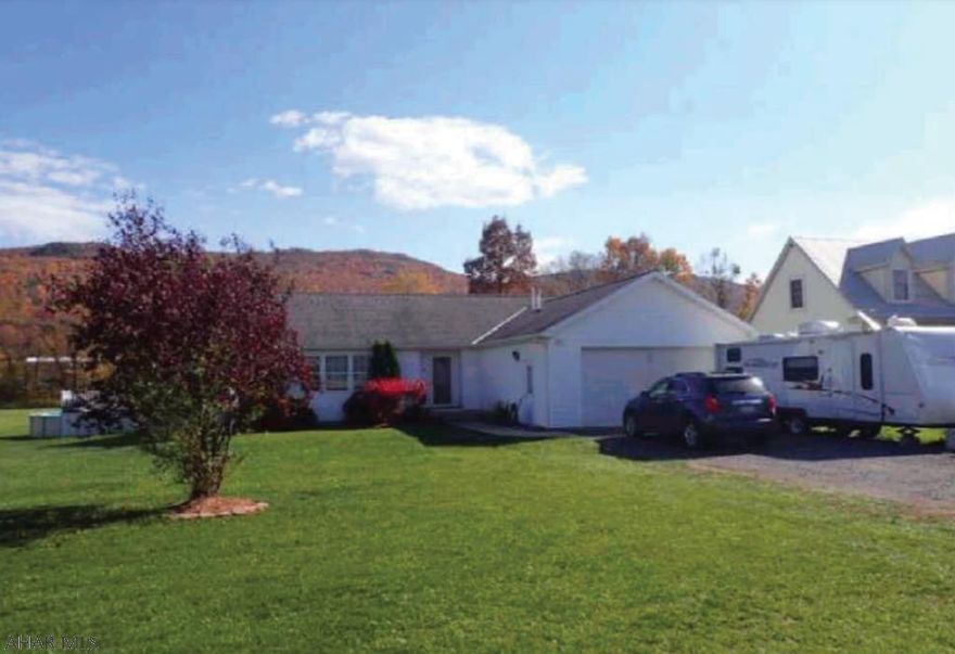 Beautiful one story home with open floor plan. Recently updated bathrooms, well cared for home. Laundry on main floor plus sun room off of dining room. Home also has two car garage.