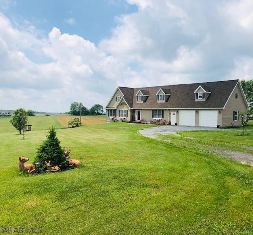 Step inside this beautiful 4 plus bedroom home beautifully situated on two acres!! This stunning cape cod home has spectacular views from all rooms. This  home has an open floor plan with the kitchen open to the living and dining room with french doors leading out to the deck.  The kitchen has a large island and recessed lighting.  First floor laundry room with nice cabinets and sink that leads out to deck. The second floor has a bonus room, full bath, office/bedroom and a huge "great room" with a beautiful gas stone fireplace and outside entrance down to the garage. The basement has a family room with bar and rec room, half bath and a huge storage room. There is a large deck overlooking the beautiful yard. The oversized two car garage is great for all your storage needs.
