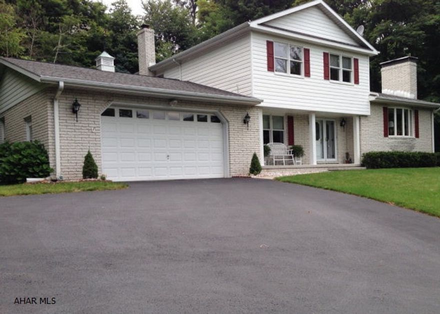 A wonderful floor plan adds to the overall appeal of this custom built 4 bedroom executive home in Barclay Manor. Double front entry doors lead onto a large and inviting central foyer. The home's design was built around privacy and gorgeous views. Attractive fireplaces are found in both formal living and family rooms. The dining room's transom window allows nature to be part of the space. Private decks and outdoor entertaining areas are found off the family room. 4 bright and sunny bedrooms with 2 custom designed bathrooms complete the 2nd floor. One of kind with quality workmanship inside and out. New furnace ensures maximum heat efficiency.