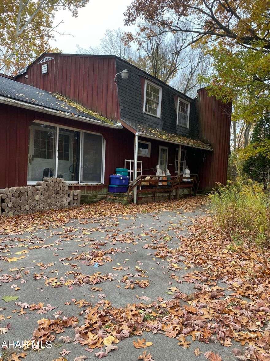 3 bedroom 2 bath Home for sale in beautiful scenic Hollidaysburg. Enjoy nature at its finest with a beautiful wooded lot and the sounds of the river from your front porch. This charming house is complete with a spiral staircase, fireplace and a 2 car attached garage. 3 car garage/barn for more storage and work space. This house is looking for the right people to give it the TLC it deserves.


Being sold AS-IS. This house is a single family home that was converted to a 2 family home. It can be easily converted back.