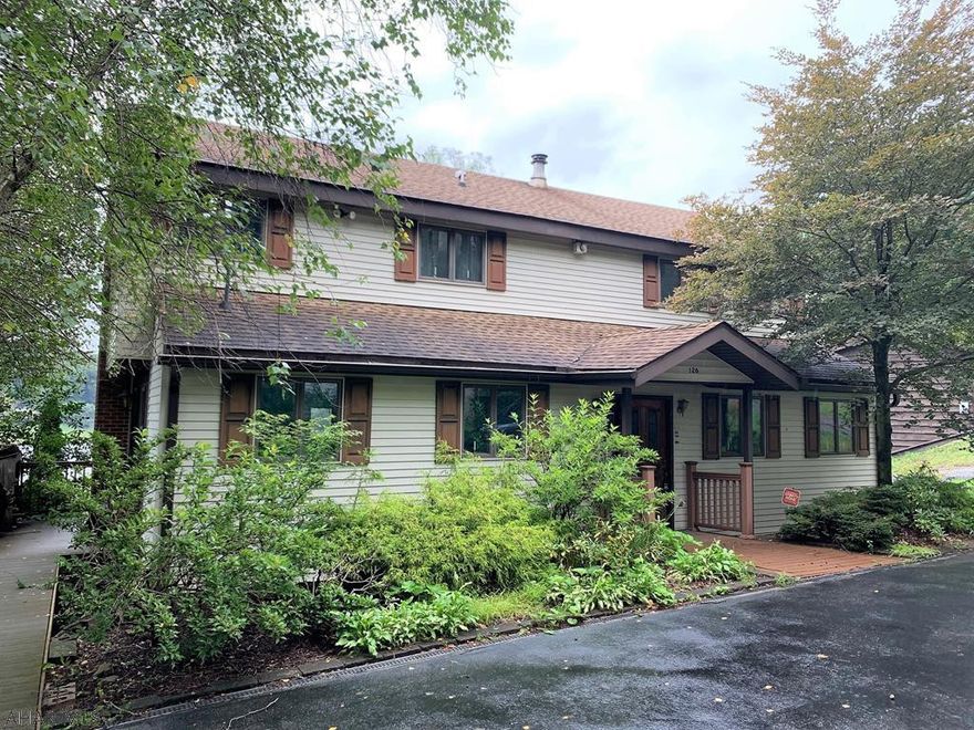 2-Story home with finished basement. Included a two-car garage and storage shed. Lake frontage with stunning views. Two boat dock spaces and boat house. Comp purposes only.