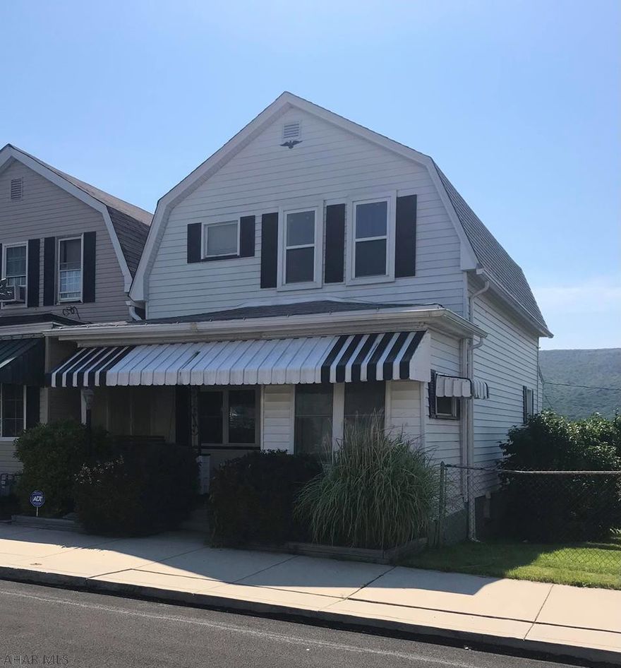 A great home with rear views of the valley!  Two story home with 3 bedroom, 1 bath. Nice covered front porch & nice rear deck with retractable awning. Fenced-in yard for the dogs & kids!. Gas fireplace in LR,  One AC unit in DR.   New roof 2013.