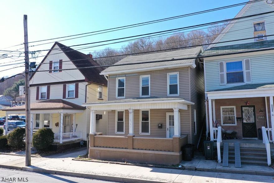 Renovated from top to bottom, this  lovely 2 1/2 story home is located in the borough of Tyrone! The whole downstairs has new flooring, ceilings, and paint. The kitchen has been remodeled with new cabinets, countertops, back splash and appliances! First floor laundry room, fenced in yard, second floor balcony, and off street parking are just a few more of the features of this beautiful home. New hot water tank, furnace and  appliances! Can you say move in ready?
