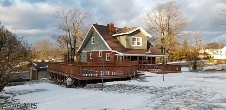 This house has it all, Beautiful newly remodeled downstairs including the brand new kitchen and living room. All appliances are included.  All kitchen appliances are newer, If you need an office at home, this home has it. The siding was put on in 2015, Brand New carpet in the living room, hallway, and staircase. New windows throughout the whole house were installed by Window World and have a lifetime transferable warranty. Nice big backyard for play or parties with a fire pit. Amazing new deck that extends off the back porch and when you get hot in the summer time take a walk on the deck and into the pool to cool off. The pool has a new pool pump and pool liner. The deck wraps the whole ways around the pool. There is a Jacuzzi tub in the downstairs bathroom. VERY MOTIVATED SELLER'S!