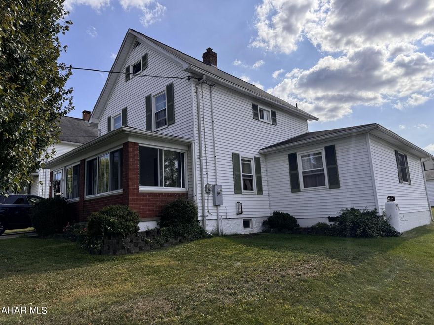 2 story 3-4 BR, 2 bath home on a corner lot. Oil HW heat. 1st floor laundry & enclosed front porch. 1 car attached garage. 16 x 22 outbuilding, currently used as a hair salon. Could be a man cave, party area, or craft area. All appliances included. $129,900