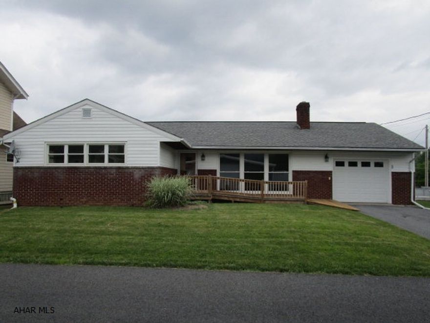 Very nicely updated rancher in the Bedford Borough. Home has refinished hardwood floors, new kitchen cabinetry, updated bath and fresh paint throughout. Updated shingle roof, thermo pane windows, oil forced air furnace and central air conditioning. Large living room with oversized windows and fireplace, three bedrooms, one bath and kitchen. Full basement with rec. room, additional bedroom and a half bathroom. One-car attached garage, front porch and level yard. Move-in ready!