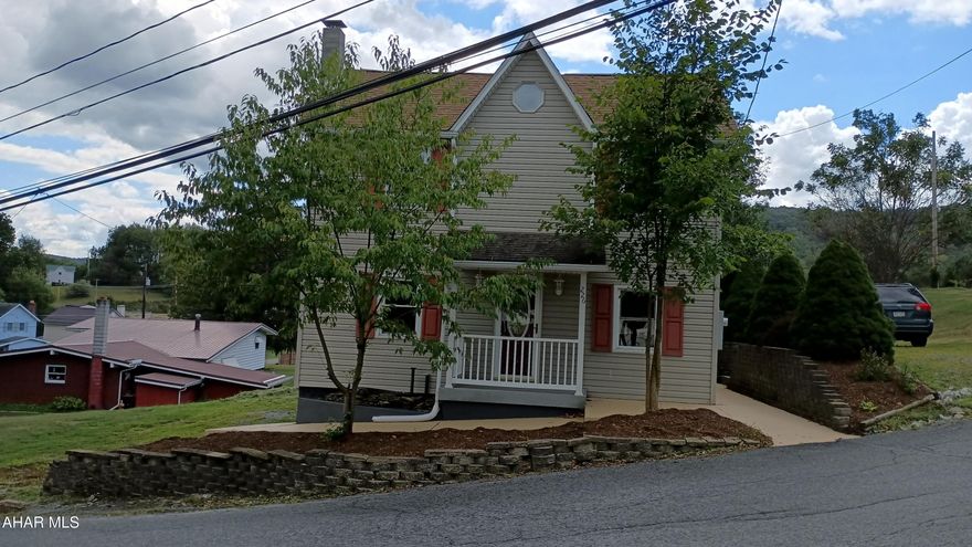 Great Remodeled Home on a Nice Sized Lot within walking distance of the School. 3 BR 2 Bath Home with Lots of Off Street Parking. Freshly Painted Throughout, a lot of New Flooring, and Beautiful Kitchen with All New Appliances! Home is Designed for One Story Living with Master BR with Master Bath, a separate Laundry Room, and Living Room with Cool Fireplace on the First Floor. Second Floor has 2 Bedrooms, Full Bath, and Extra Room with a short ceiling for Children or Storage. Great Outdoor Living with the Huge Vinyl Deck, Fire Pit Area, and Hot Tub. A Tiny House is on the Back of the Lot that would make a Great Play House or Man/Woman Cave.